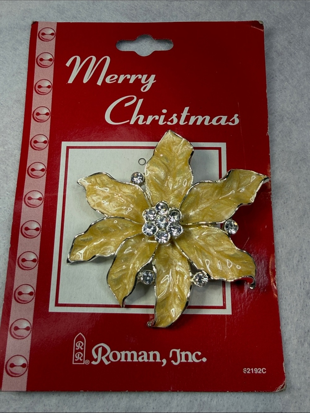 Roman Inc. Cream Enamel Poinsettia Brooch with Clear Rhinestones